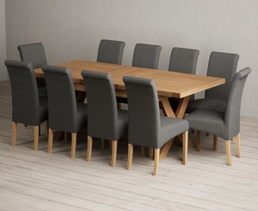View Extending buckley 160cm solid oak dining table with 10 charcoal grey scroll back chairs View Extending buckley 160cm solid oak dining table with 10 charcoal grey scroll back chairs
