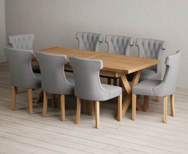 View Extending buckley 200cm solid oak dining table with 8 grey clara chairs View Extending buckley 200cm solid oak dining table with 8 grey clara chairs