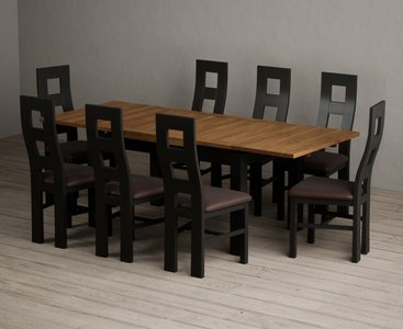 View Extending buxton 140cm oak and black painted dining table with 8 brown painted chairs View Extending buxton 140cm oak and black painted dining table with 8 brown painted chairs