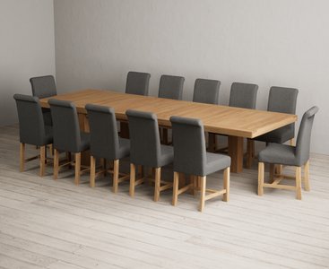 View Extending callington 230cm oak dining table with 12 charcoal grey braced chairs View Extending callington 230cm oak dining table with 12 charcoal grey braced chairs