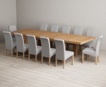 View Extending callington 230cm oak dining table with 12 grey scroll back chairs View Extending callington 230cm oak dining table with 12 grey scroll back chairs