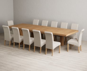 View Extending callington 230cm oak dining table with 12 natural scroll back chairs View Extending callington 230cm oak dining table with 12 natural scroll back chairs