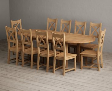 View Extending caversham oak oval dining table with 10 oak natural chairs View Extending caversham oak oval dining table with 10 oak natural chairs