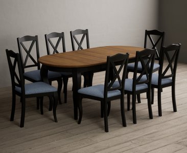 View Extending chateau noir 140cm oak and black painted oval dining table with 8 blue chateau noir chairs View Extending chateau noir 140cm oak and black painted oval dining table with 8 blue chateau noir chairs