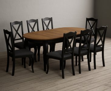 View Extending chateau noir 140cm oak and black painted oval dining table with 8 charcoal grey chateau noir chairs View Extending chateau noir 140cm oak and black painted oval dining table with 8 charcoal grey chateau noir chairs