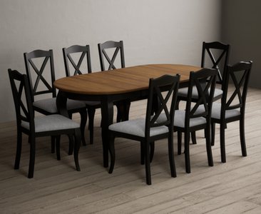 View Extending chateau noir 140cm oak and black painted oval dining table with 8 light grey chateau noir chairs View Extending chateau noir 140cm oak and black painted oval dining table with 8 light grey chateau noir chairs