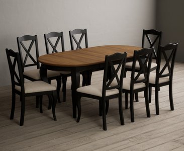View Extending chateau noir 140cm oak and black painted oval dining table with 8 linen chateau noir chairs View Extending chateau noir 140cm oak and black painted oval dining table with 8 linen chateau noir chairs