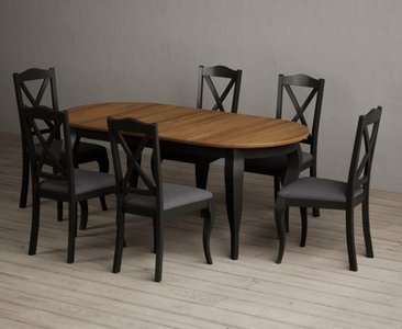 View Extending chateau noir 140cm oak and black painted oval dining table with 6 charcoal grey chateau noir chairs View Extending chateau noir 140cm oak and black painted oval dining table with 6 charcoal grey chateau noir chairs
