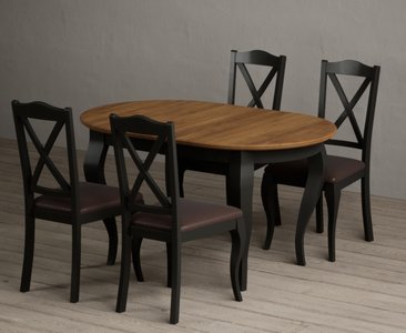View Extending chateau noir 140cm oak and black painted oval dining table with 4 brown chateau noir chairs View Extending chateau noir 140cm oak and black painted oval dining table with 4 brown chateau noir chairs