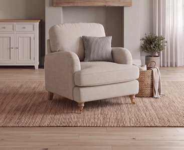 View Chilworth natural fabric armchair with navy cushion