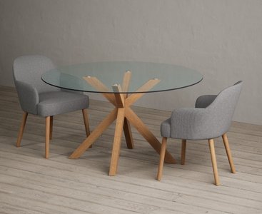 View Lakelyn 140cm round solid oak and glass dining table with 2 light grey oliver chairs View Lakelyn 140cm round solid oak and glass dining table with 2 light grey oliver chairs
