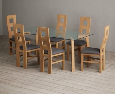 View Lakelyn 180cm solid oak and glass dining table with 8 blue natural chairs View Lakelyn 180cm solid oak and glass dining table with 8 blue natural chairs