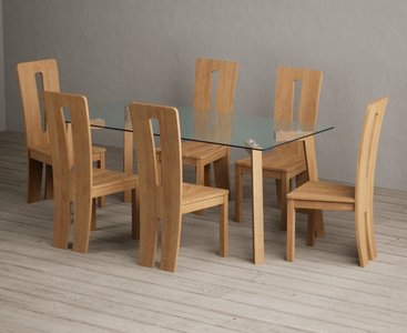 View Lakelyn 180cm solid oak and glass dining table with 8 oak lucca chairs View Lakelyn 180cm solid oak and glass dining table with 8 oak lucca chairs