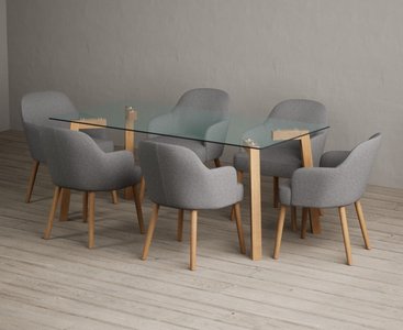 View Lakelyn 180cm solid oak and glass dining table with 4 light grey oliver chairs View Lakelyn 180cm solid oak and glass dining table with 4 light grey oliver chairs