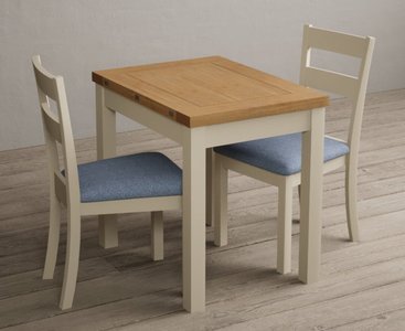 View Extending hadleigh oak and cream painted dining table with 4 oak kendal chairs View Extending hadleigh oak and cream painted dining table with 4 oak kendal chairs