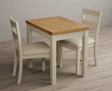 View Extending hadleigh oak and cream painted dining table with 2 linen kendal chairs View Extending hadleigh oak and cream painted dining table with 2 linen kendal chairs