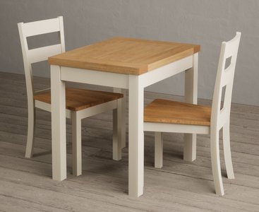 View Extending hadleigh oak and cream painted dining table with 2 oak kendal chairs View Extending hadleigh oak and cream painted dining table with 2 oak kendal chairs