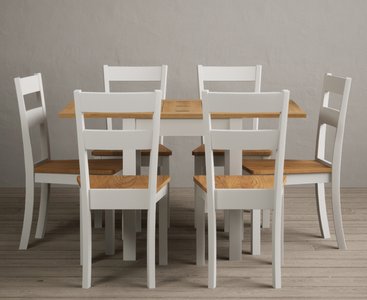 View Extending hadleigh oak and signal white painted dining table with 6 oak kendal chairs View Extending hadleigh oak and signal white painted dining table with 6 oak kendal chairs