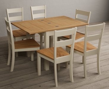 View Extending hadleigh oak and cream painted dining table with 6 oak kendal chairs View Extending hadleigh oak and cream painted dining table with 6 oak kendal chairs