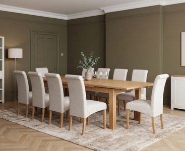 View Extending buxton 140cm solid oak dining table with 10 natural scroll back chairs View Extending buxton 140cm solid oak dining table with 10 natural scroll back chairs