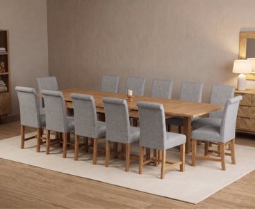 View Extending buxton 180cm solid oak dining table with 12 grey braced chairs View Extending buxton 180cm solid oak dining table with 12 grey braced chairs