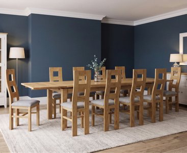 View Extending buxton 180cm solid oak dining table with 10 light grey natural chairs View Extending buxton 180cm solid oak dining table with 10 light grey natural chairs