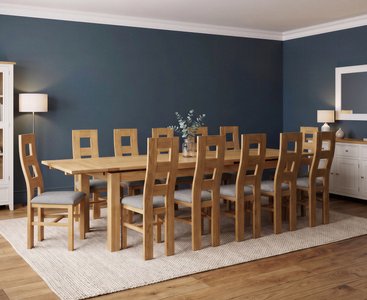 View Extending buxton 180cm solid oak dining table with 12 light grey natural chairs View Extending buxton 180cm solid oak dining table with 12 light grey natural chairs