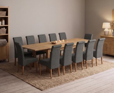 View Extending buxton 180cm solid oak dining table with 12 charcoal grey scroll back chairs View Extending buxton 180cm solid oak dining table with 12 charcoal grey scroll back chairs