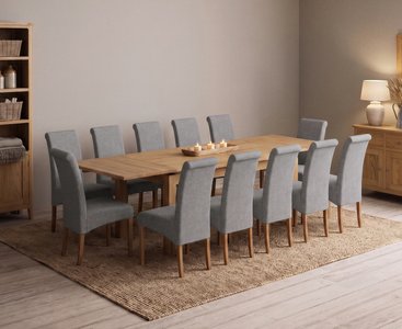 View Extending buxton 180cm solid oak dining table with 12 grey scroll back chairs View Extending buxton 180cm solid oak dining table with 12 grey scroll back chairs
