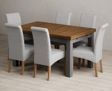 Photo of extending buxton 140cm oak and charcoal grey dining table with 6 grey scroll back chairs