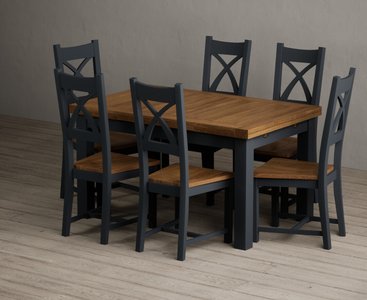 View Extending buxton 140cm oak and dark blue dining table with 6 rustic oak painted chairs View Extending buxton 140cm oak and dark blue dining table with 6 rustic oak painted chairs