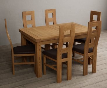 View Extending buxton 140cm solid oak dining table with 10 oak natural chairs View Extending buxton 140cm solid oak dining table with 10 oak natural chairs