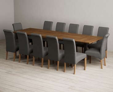 View Extending buxton 180cm oak and charcoal grey dining table with 12 charcoal grey scroll back chairs View Extending buxton 180cm oak and charcoal grey dining table with 12 charcoal grey scroll back chairs