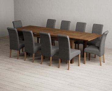 View Extending buxton 180cm rustic solid oak dining table with 10 charcoal grey scroll back chairs View Extending buxton 180cm rustic solid oak dining table with 10 charcoal grey scroll back chairs