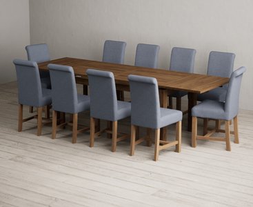 Photo of extending buxton 180cm rustic solid oak dining table with 10 blue braced chairs