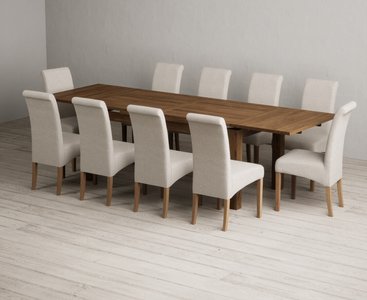 View Extending buxton 180cm rustic solid oak dining table with 10 natural scroll back chairs View Extending buxton 180cm rustic solid oak dining table with 10 natural scroll back chairs
