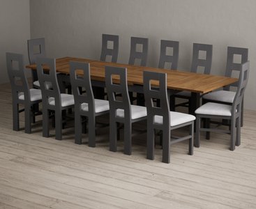 View Extending buxton 180cm oak and charcoal grey dining table with 12 light grey painted chairs View Extending buxton 180cm oak and charcoal grey dining table with 12 light grey painted chairs