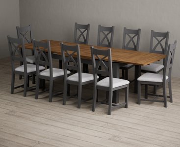 View Extending buxton 180cm oak and charcoal grey dining table with 10 light grey painted chairs View Extending buxton 180cm oak and charcoal grey dining table with 10 light grey painted chairs