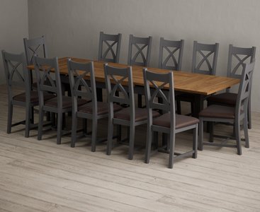 View Extending buxton 180cm oak and charcoal grey dining table with 12 brown painted chairs View Extending buxton 180cm oak and charcoal grey dining table with 12 brown painted chairs