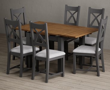 View Extending buxton 90cm oak and charcoal grey dining table with 6 light grey painted chairs View Extending buxton 90cm oak and charcoal grey dining table with 6 light grey painted chairs