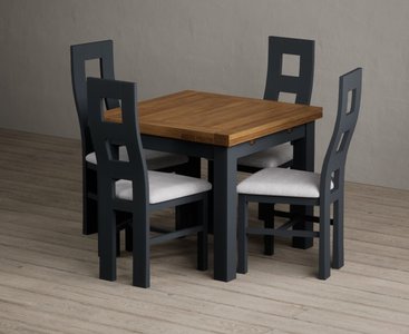 View Extending buxton 90cm oak and dark blue painted dining table with 4 blue painted chairs View Extending buxton 90cm oak and dark blue painted dining table with 4 blue painted chairs