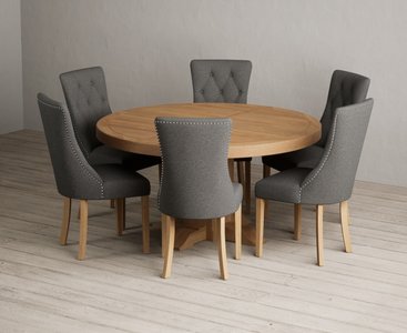 View Helmsley 150cm solid oak round pedestal dining table with 6 grey beatrix chairs View Helmsley 150cm solid oak round pedestal dining table with 6 grey beatrix chairs