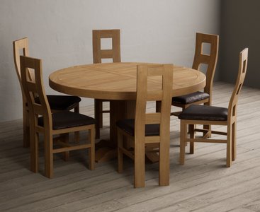 View Helmsley 150cm solid oak round pedestal dining table with 8 brown natural chairs View Helmsley 150cm solid oak round pedestal dining table with 8 brown natural chairs