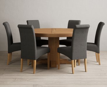 View Helmsley 150cm solid oak round pedestal dining table with 6 charcoal grey scroll back chairs View Helmsley 150cm solid oak round pedestal dining table with 6 charcoal grey scroll back chairs