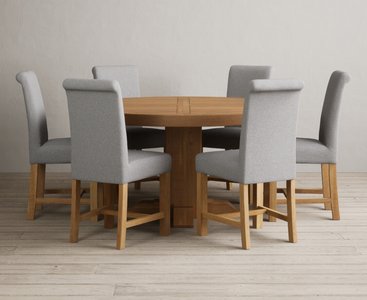 View Helmsley 150cm solid oak round pedestal dining table with 6 grey braced chairs View Helmsley 150cm solid oak round pedestal dining table with 6 grey braced chairs