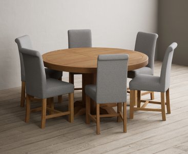 View Helmsley 150cm solid oak round pedestal dining table with 8 grey braced chairs View Helmsley 150cm solid oak round pedestal dining table with 8 grey braced chairs