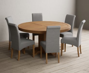 View Helmsley 150cm solid oak round pedestal dining table with 8 grey scroll back chairs View Helmsley 150cm solid oak round pedestal dining table with 8 grey scroll back chairs