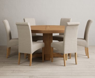 View Helmsley 150cm solid oak round pedestal dining table with 6 natural scroll back chairs View Helmsley 150cm solid oak round pedestal dining table with 6 natural scroll back chairs