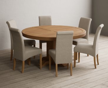 View Helmsley 150cm solid oak round pedestal dining table with 8 natural scroll back chairs View Helmsley 150cm solid oak round pedestal dining table with 8 natural scroll back chairs