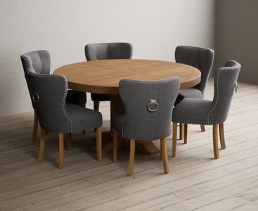 View Helmsley 150cm solid oak round pedestal dining table with 8 grey keswick chairs View Helmsley 150cm solid oak round pedestal dining table with 8 grey keswick chairs